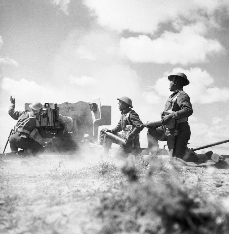 Ghurkas in action with a 6 pdr anti tank gun in Tunisia 16 March 1943. NA1103 - The coins struck with WWII bullets collected from the battlefield…