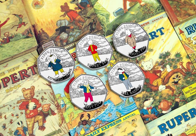 LS IOM Silver Proof with spot colour Rupert 50p set Lifestyle - Rupert Bear features on BRAND NEW 50p! New designs revealed...