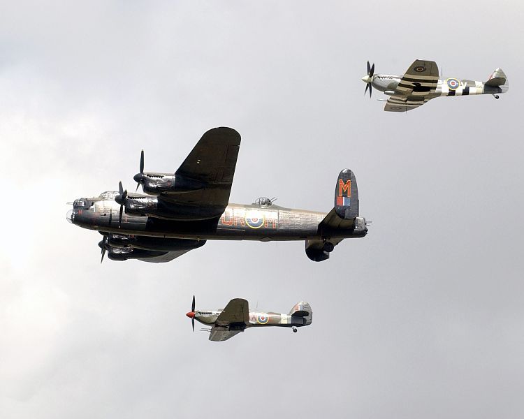 750px A flypast of three planes from the Battle of Britain Memorial Flight during the International Air Day at RNAS Yeovilton. MOD 45145202 - The Avro Lancaster – a historic, aeronautical icon…