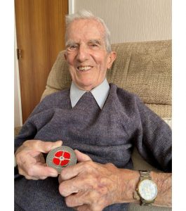 Jim Healy with 2021 Remembrance Masterpiece Poppy Coin