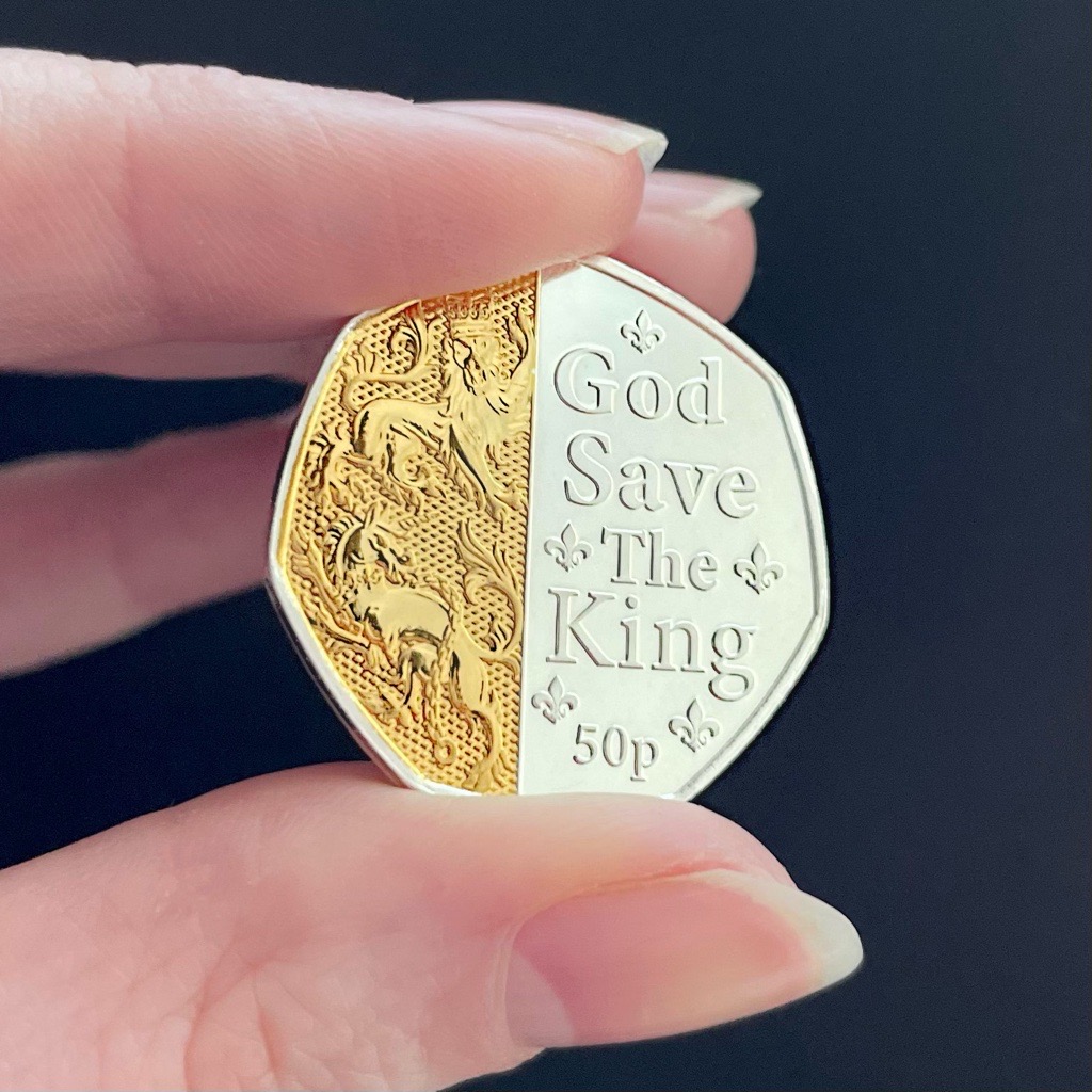 King Charles III Coronation Coin - the Dual-Plated 50p.
Featuring the inscription, "God Save the King"
Includes gold plating on a portion of the coin