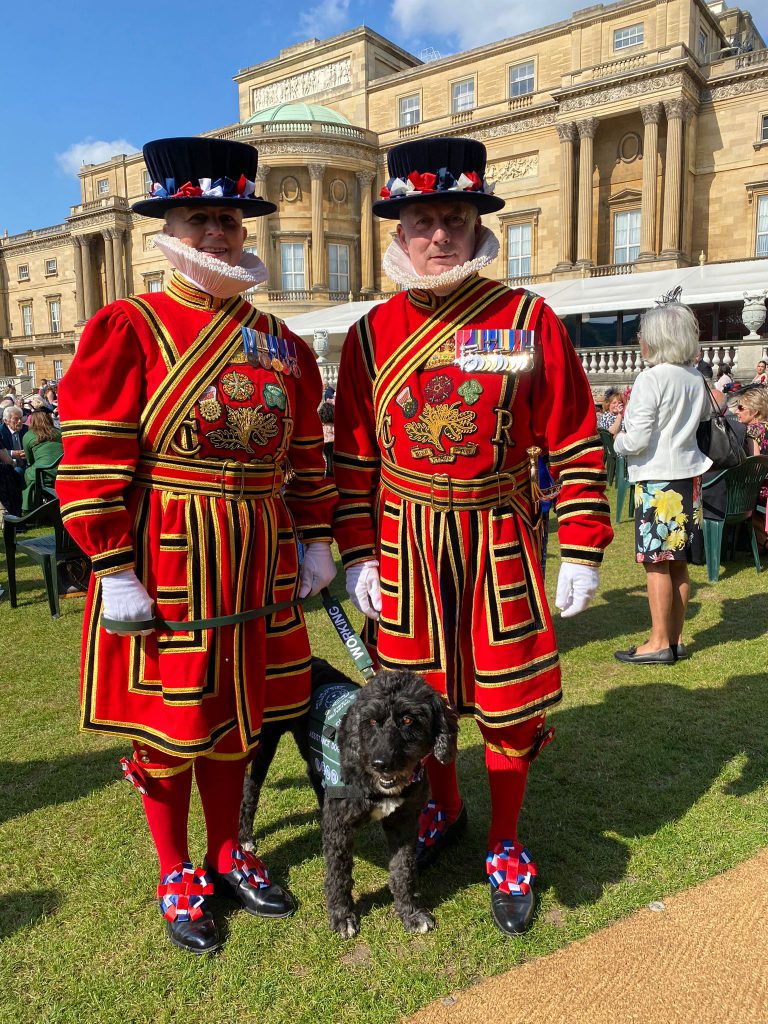 Yeoman of the Guards were in attendance, pictured alongside a service dog at the event.