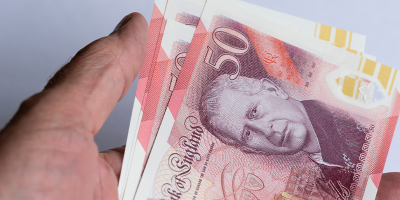 holding bank notes - Help Redesign the UK&#8217;s Banknotes: Public Invited to Choose New Themes